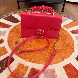 Elegant Pink Handbag with Gold Accents